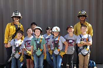 Fire Camp participants with two instructors