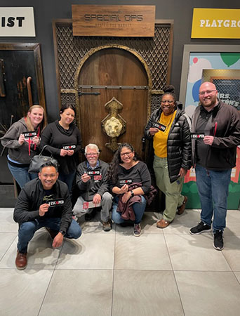 Staff outside of escape room