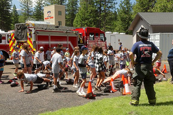Fire Camp with students and fire fighter