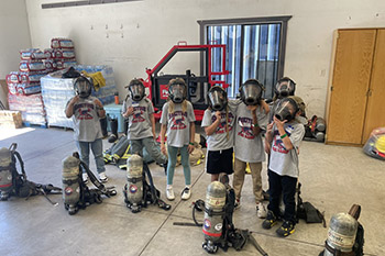 Fire Camp with students wearing breating masks
