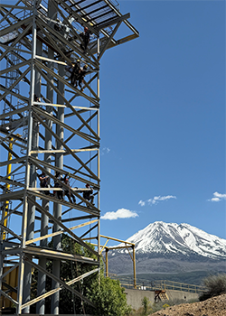 Metal tower with Mt. Shasta in background