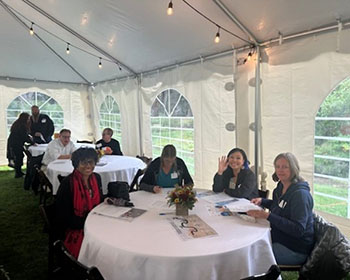 Business representatives sitting at tables
