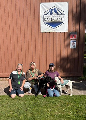 Volunteers with puppies