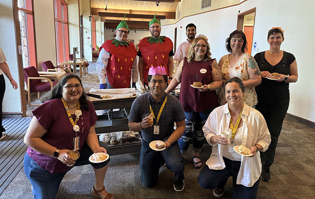 Strawberry cart with staff.