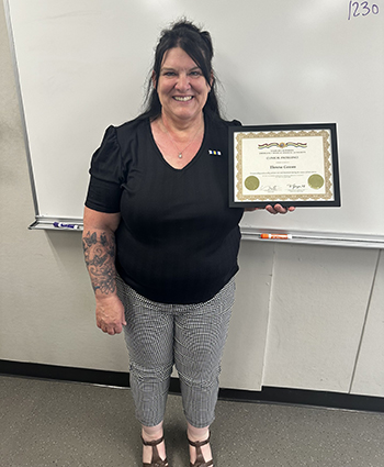 Theresa Gowan receiving award.