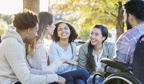 Group of students with one in wheelchair